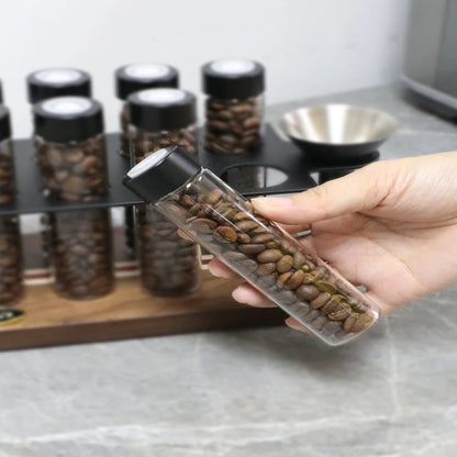 ALIKISSCAFE six-tube coffee bean storage system for home baristas.