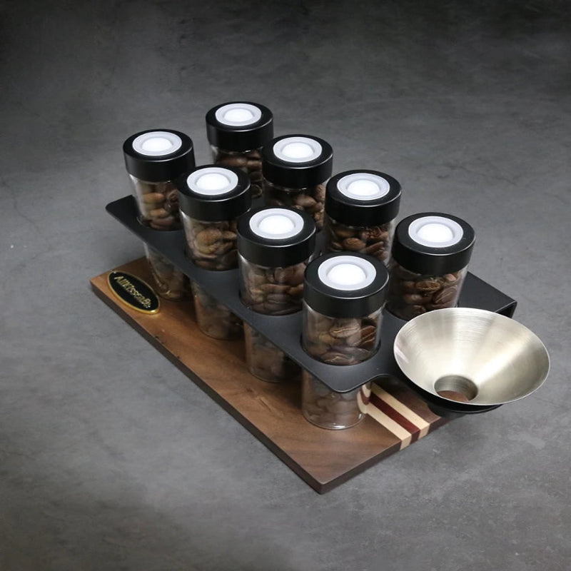A twelve-tube single-dose coffee bean organizer for espresso stations.