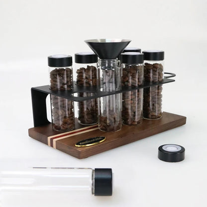 Single-dose coffee storage system for home espresso preparation.