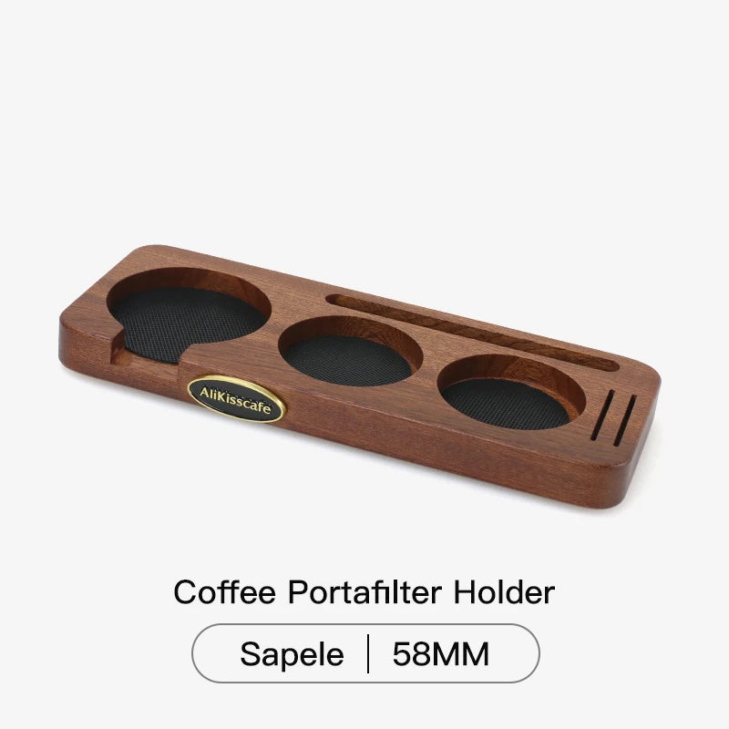 Beech wood coffee tamper station beside a home espresso machine.