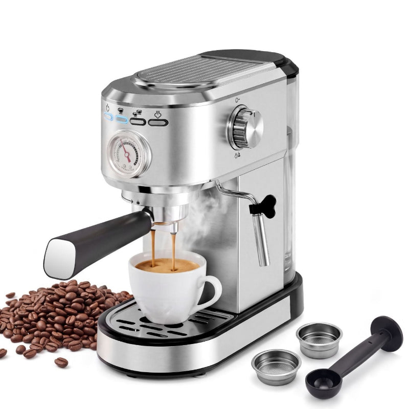 A stainless steel semi-automatic espresso machine with a white cup of espresso brewing underneath, coffee beans scattered on the left, and two metal measuring cups with a black spoon on the right, all on a white background.