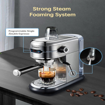 Espresso machine with strong steam foaming system on a dark surface with coffee beans.