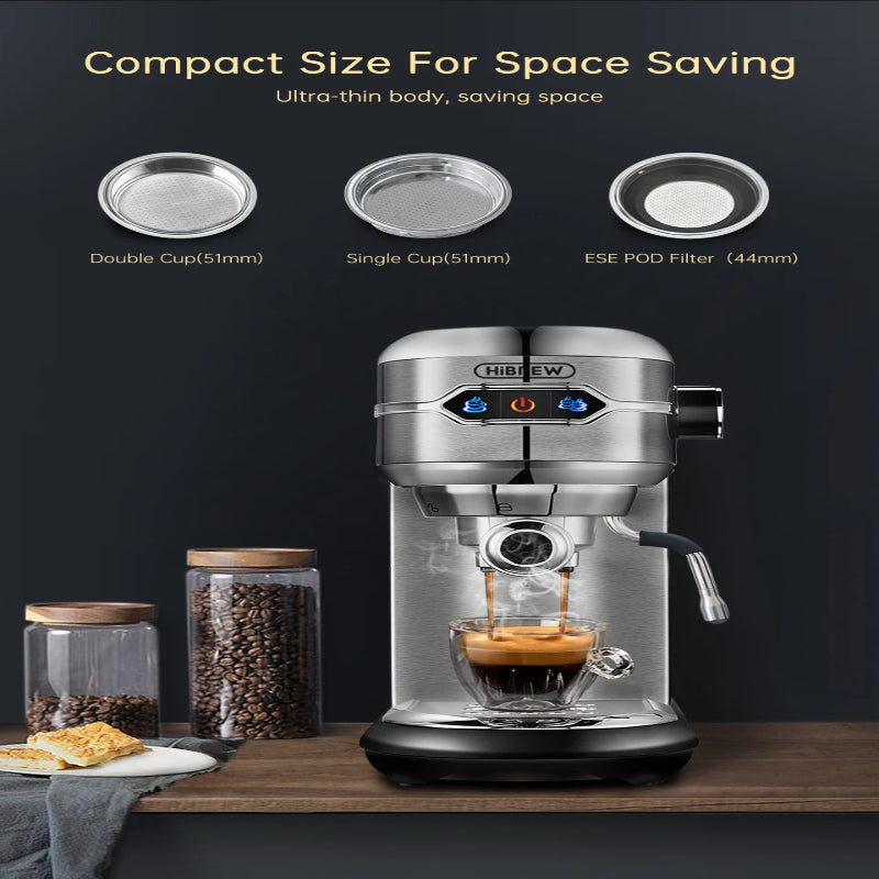 Coffee machine with a glass cup of coffee on a wooden surface, surrounded by jars and a towel.