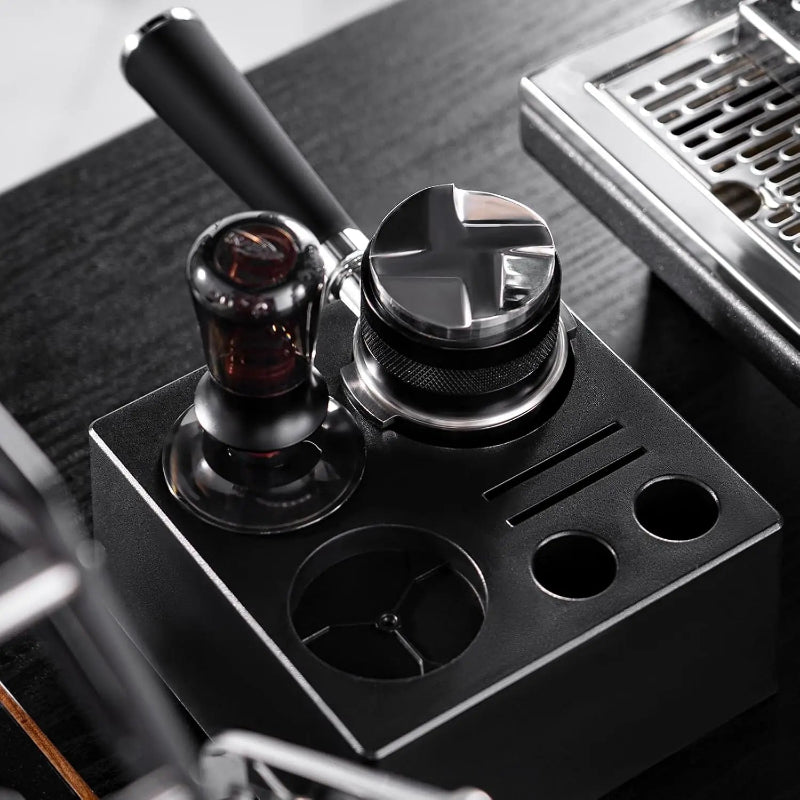 Close-up of a coffee machine's control panel with various buttons and levers.