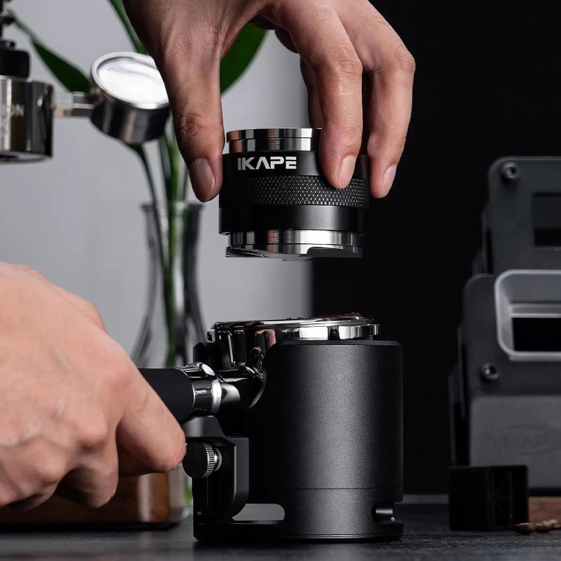 The IKAPE espresso tool set features an integrated tamper station.