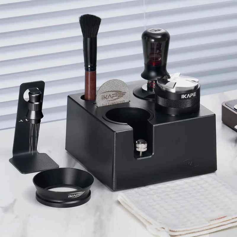 Espresso tamper station with professional coffee tools.