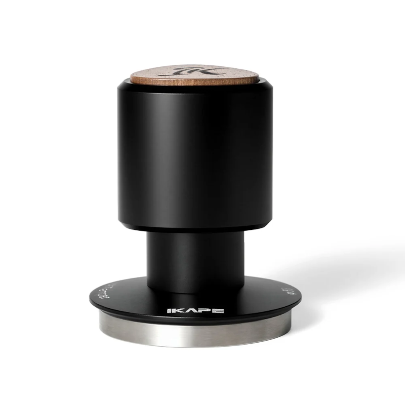 Precision coffee tamper with a stainless steel base.