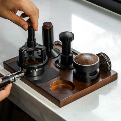 PEISI espresso station with portafilter holder and accessory storage.