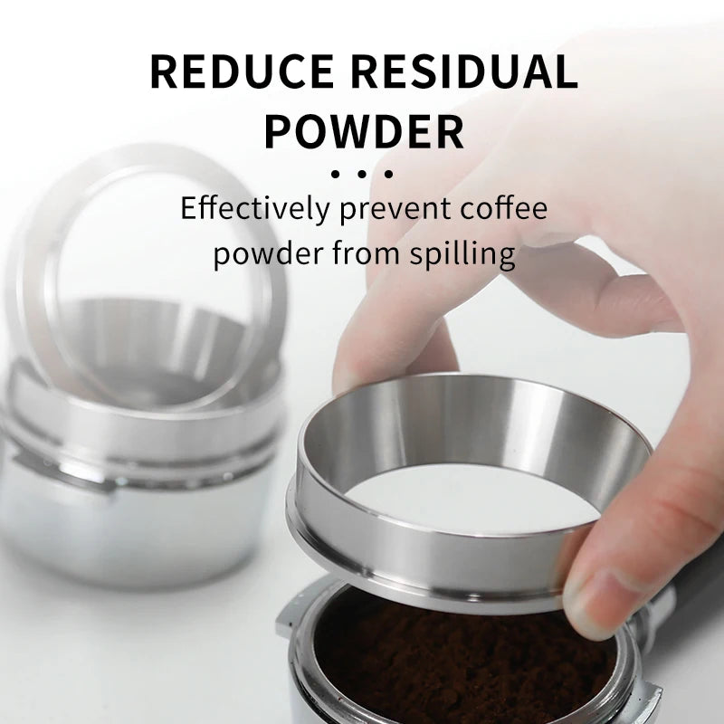 Metal coffee grinder with a hand holding it, showing coffee powder inside, on a white background.