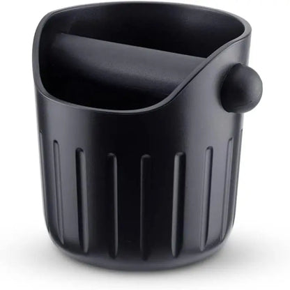 The iCafilas espresso knock box keeps coffee stations clean and organized.