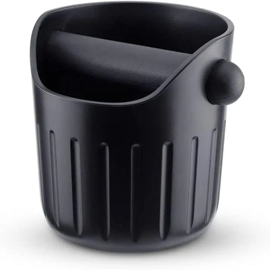 The iCafilas espresso knock box keeps coffee stations clean and organized.
